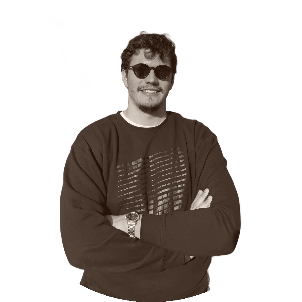 Sergio Pérez with sunglasses and arms crossed